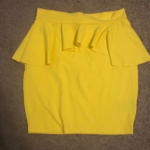 BEBE size S BODYCON PEPLUM yellow mini skirt